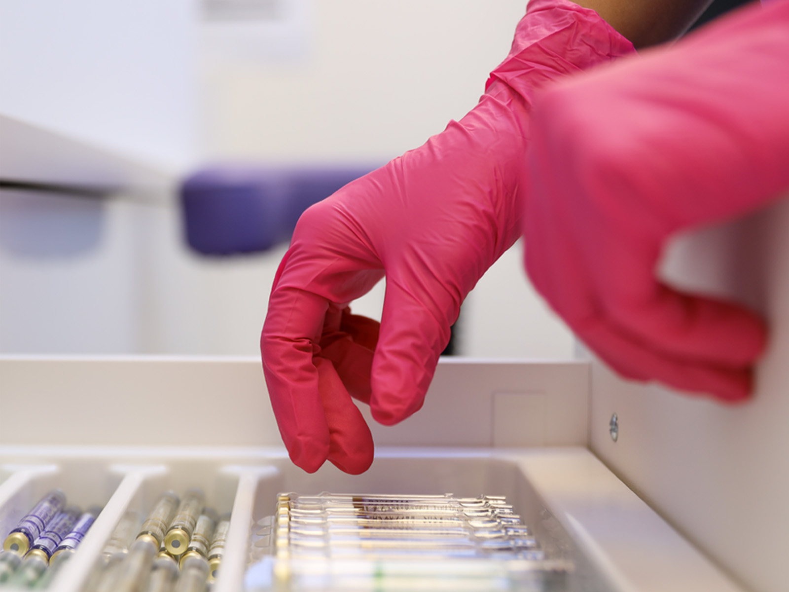 Laboratory gloves in use